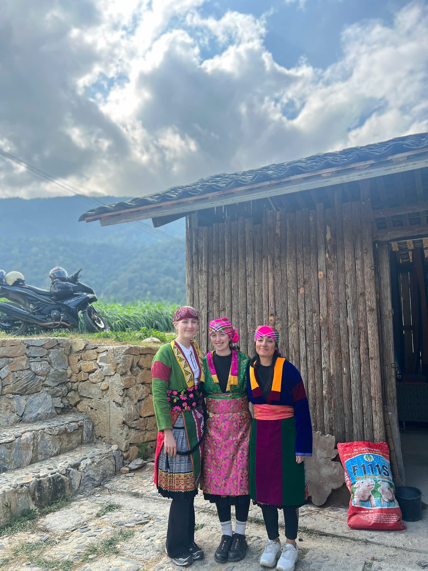 Meetup's foreign tourists wearing traditional ethnic minority clothing in northern Vietnam.