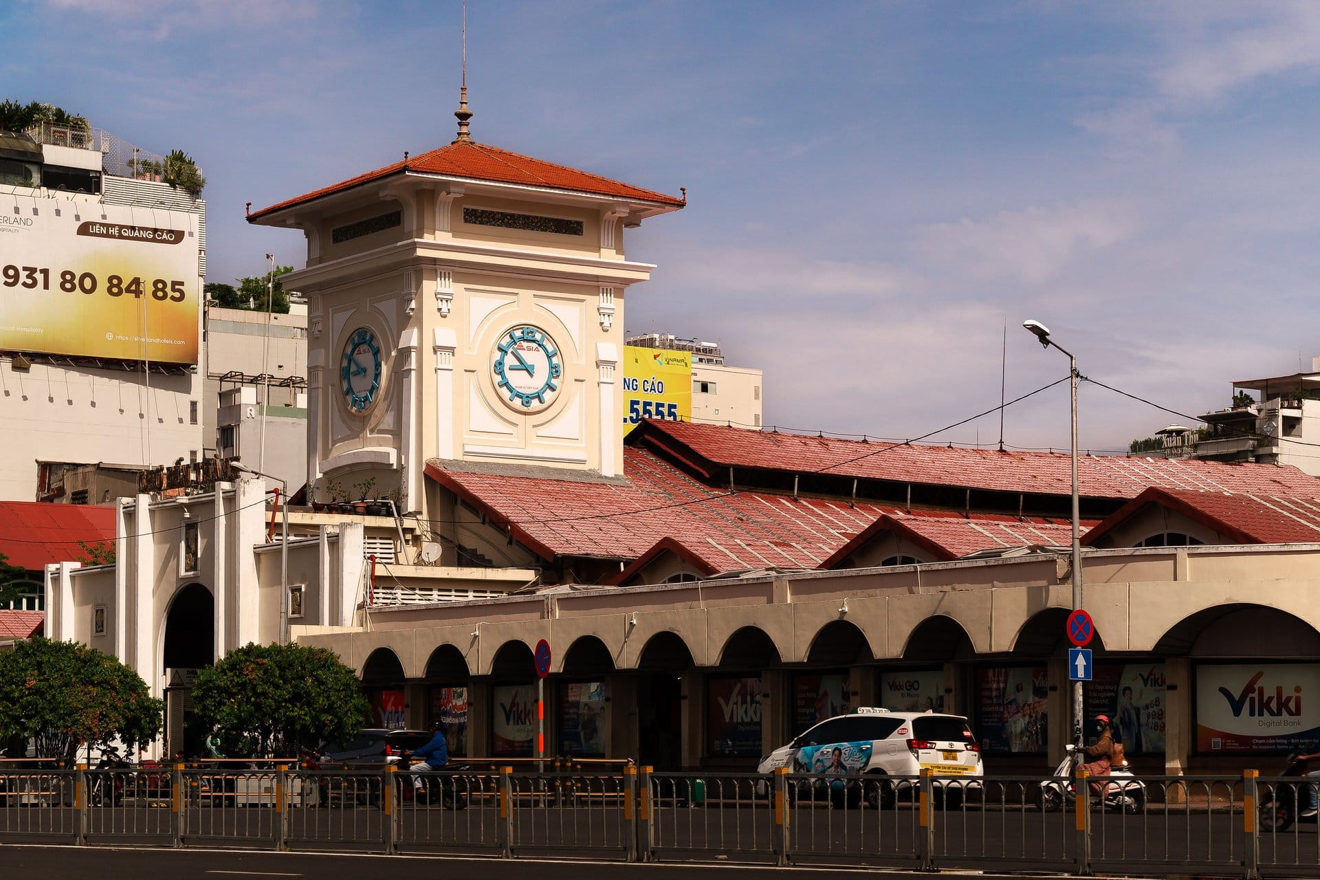 Riverfront cafes and greenery line a quiet street in Thao Dien along the Saigon River