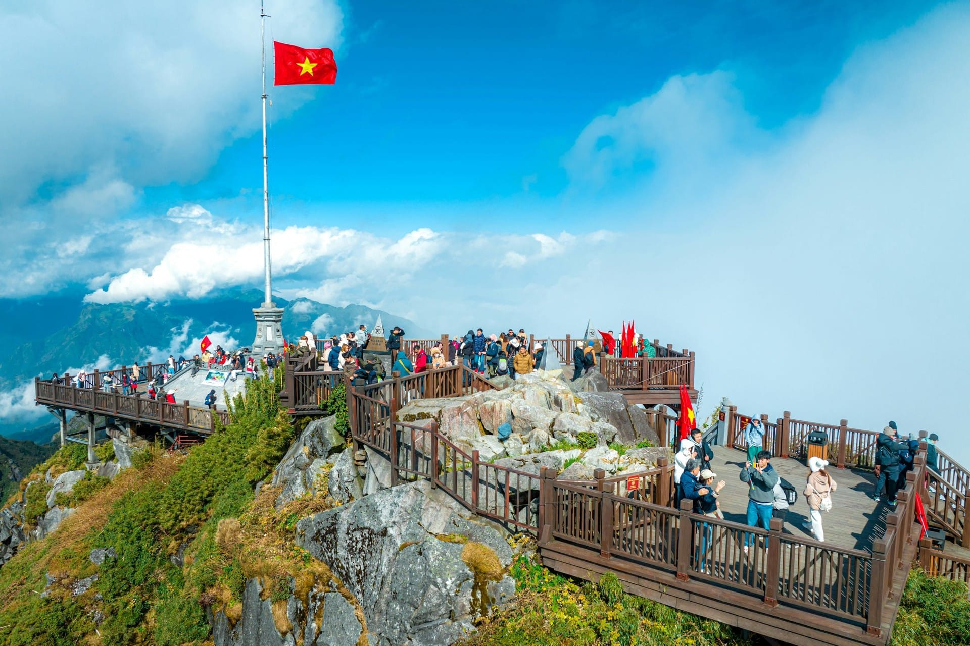 Great Buddha statue on Fansipan peak above clouds