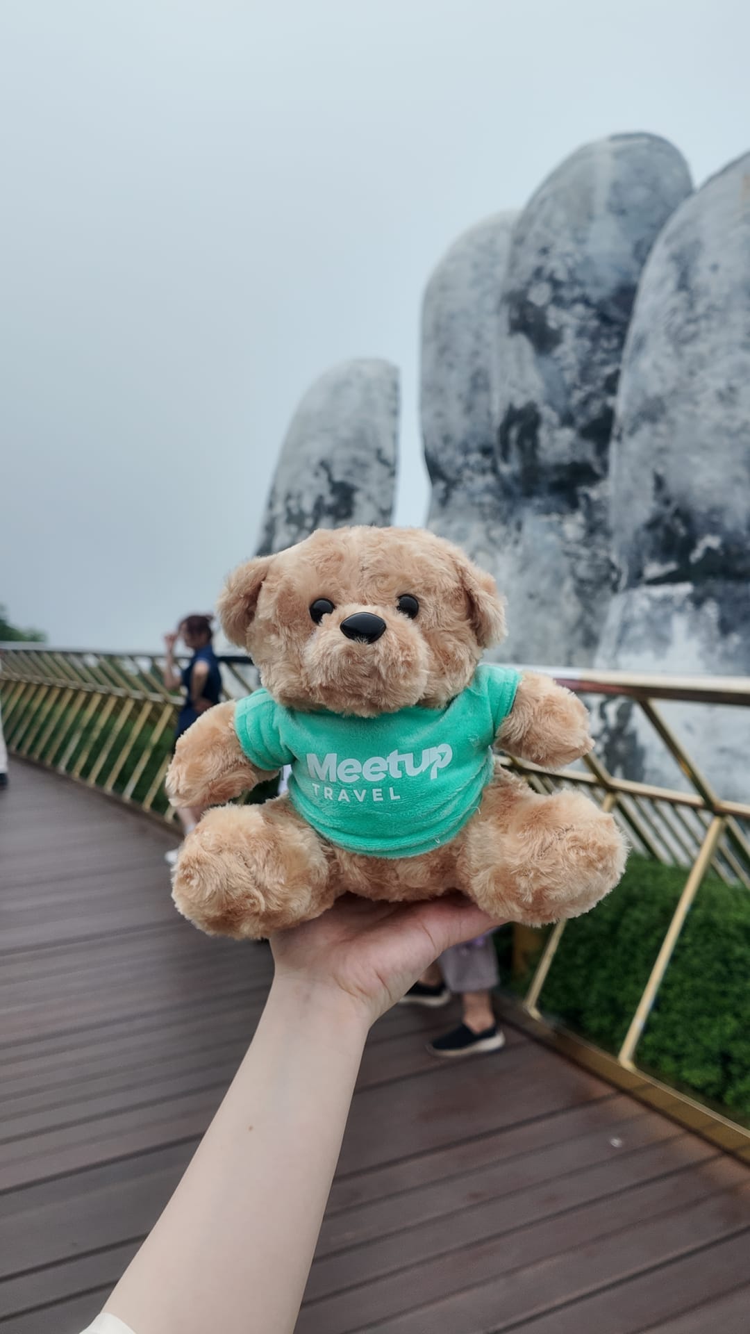 Two giant stone hands hold up the Golden Bridge walkway at Ba Na Hills above Da Nang.
