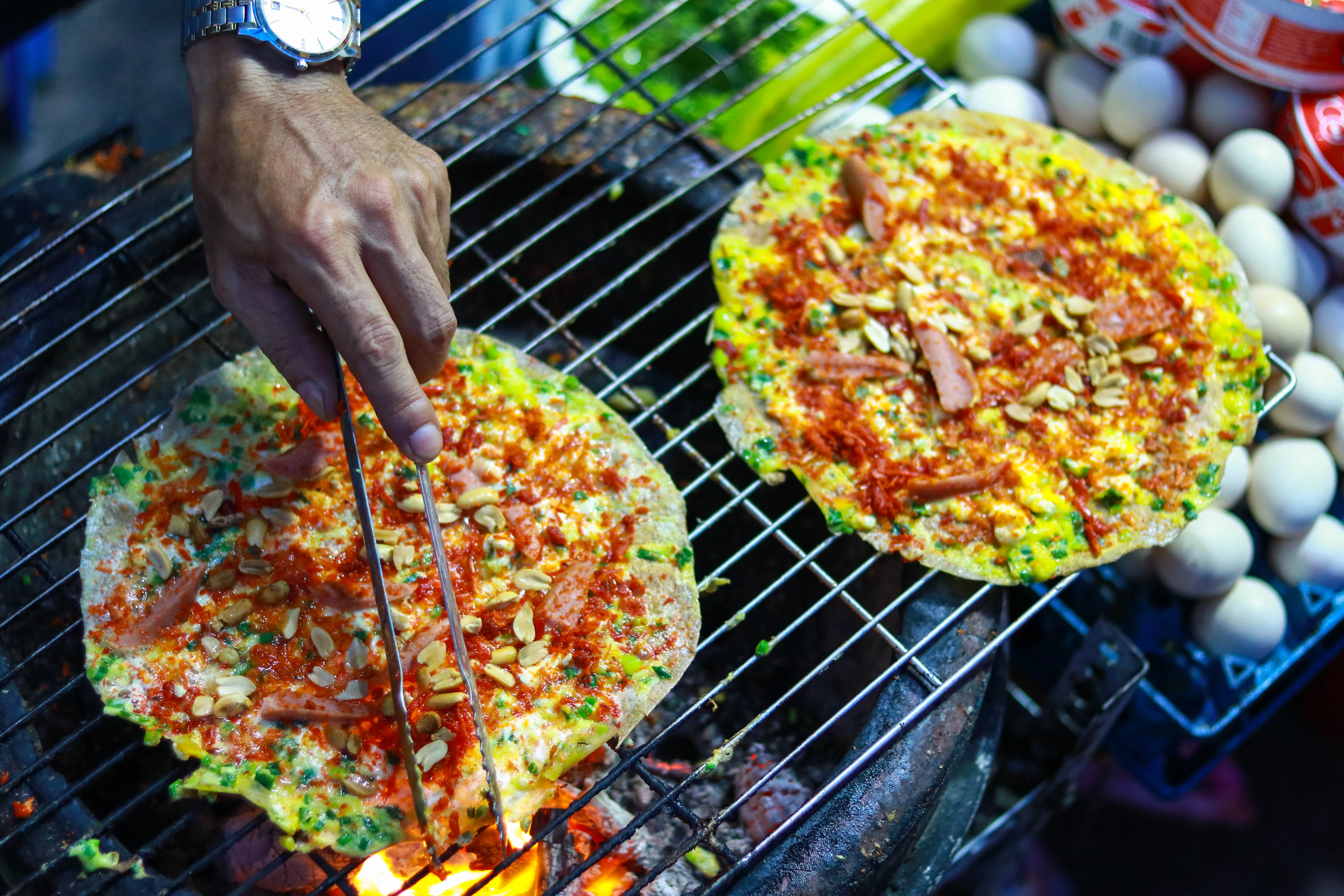 Vietnamese grilled rice paper pizza banh trang nuong street food