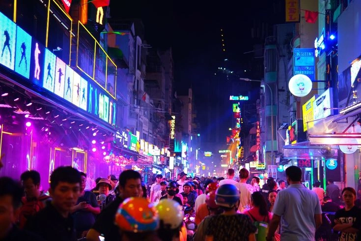 Crowds filling Bui Vien Walking Street after dark, Ho Chi Minh City